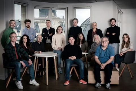 Members of Charlie Hebdo pose during a photo session in Paris in March 2024. 