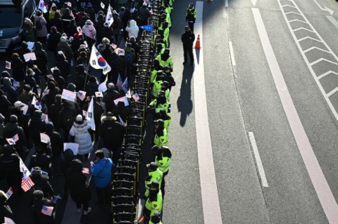 Police keep watch as supporters of South Korea's impeached President Yoon Suk Yeol gather