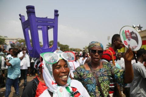 The jubilant crowd wore the green, red, black and white of Mahama's National Democratic Congress