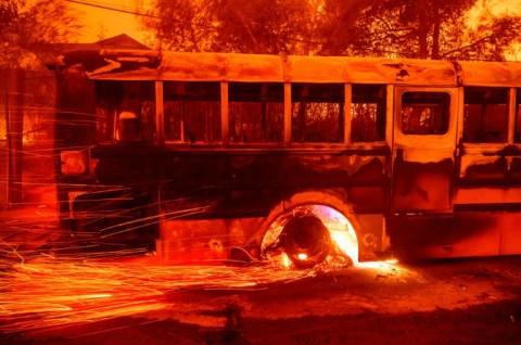 A burning bus at Aveson School of Leaders elementary school in Los Angeles County