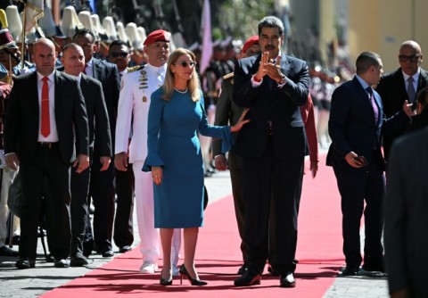 Venezuela's President Nicolas Maduro with First Lady Cilia Flores ahead of his swearing-in for a third six-eyar term