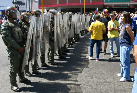 Despite biting economic woes, Maduro has kept a tight grip  on the country with the help of the military and police 