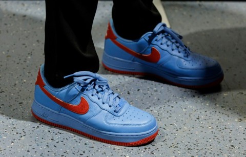 A person wears sneakers in the colours of Germany's far-right Alternative for Germany (AfD) party during a congress in Riesa