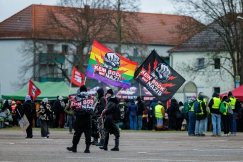 Demonstrators shouting 'No to Nazis' outside the venue in the eastern town of Riesa