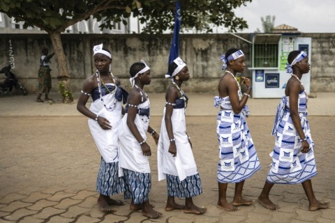 Dancers incarnate a divine presence representing perfect happiness and riches