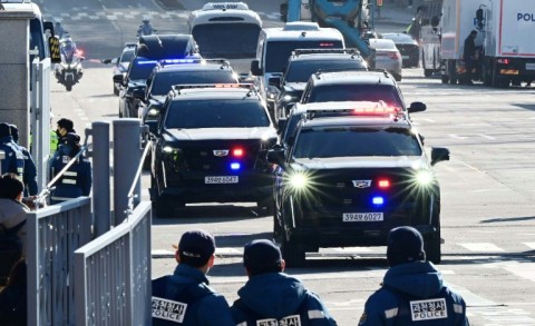 A motorcade carrying impeached South Korea President Yoon Suk Yeol arrives at the complex building housing the Corruption Investigation Office for High-ranking Officials (CIO) in Seoul