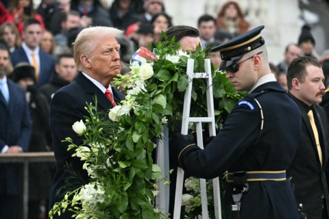 US President-elect Donald Trump lays a wreath at the Tomb of the Unknown Soldier at Arlington National Cemetery on January 19, 2025