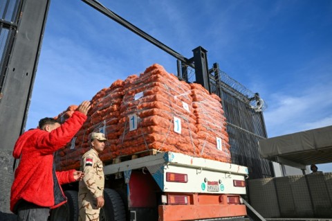 Minutes after the truce began, the UN said the first aid trucks had entered Gaza