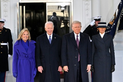 US President Joe Biden and First Lady Jill Biden pose alongside President-elect Donald Trump and Melania Trump as they arrive at the White House in Washington, DC, on January 20, 2025, before departing for the US Capitol where Trump will be sworn in as the 47th US President.