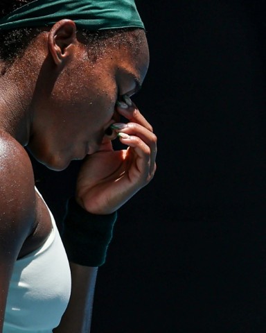 Coco Gauff reacts after a point against Spain's Paula Badosa