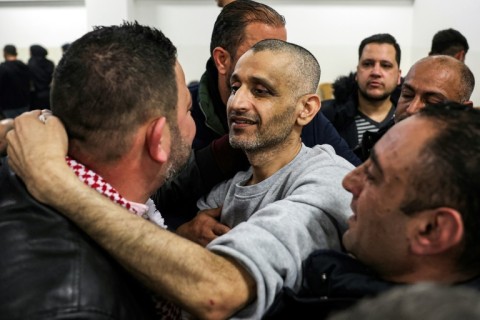 Well-wishers congratulate freed prisoner Mahmud al-Arda on his release.