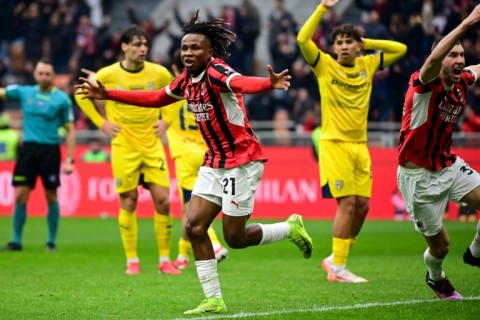 AC Milan's Nigerian midfielder Samuel Chukwueze (C) celebrates scoring his team's third goal against Parma at the San Siro Stadium in Milan