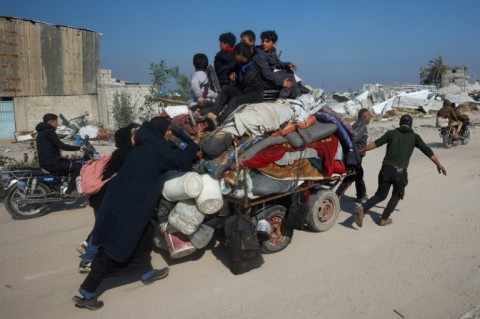 Displaced Gazan transport their belongings back towards the territory's north