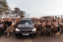 Amabutho (Zulu regiments) sing and chant praises in front of a convoy carrying the coffin of Mangosuthu Buthelezi. AFP/Rajesh Jantilal