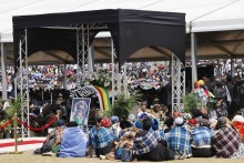 Mourners gather around the coffin of the Zulu prince Mangosuthu Buthelezi. AFP/Marco Longari