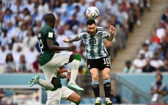 Argentina's forward #10 Lionel Messi (R) heads the ball during the Qatar 2022 World Cup Group C football match between Argentina and Saudi Arabia at the Lusail Stadium in Lusail, north of Doha on November 22, 2022.