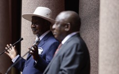 File: Ugandan President Yoweri Museveni (L) speaks during a press conference after a meeting with South African President Cyril Ramaphosa (R) at the Union Buildings in Pretoria on February 28, 2023. GUILLEM SARTORIO / AFP