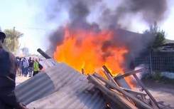 Diepsloot residents say they will continue to protest until President Cyril Ramaphosa comes to address them. Violence flared up in the area when residents took to the streets to protest the crime levels. (eNCA\screenshot)