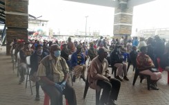 Pensioners and people with disabilities waiting for Sassa payouts at Jabulani Mall.