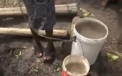 Residents of Dukuduku Village have been sharing a water well with farm animals for over 50 years. (eNCA\Screenshot)