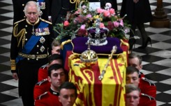 The king's message on the floral tribute to his mother read: 'In loving and devoted memory. Charles R.'