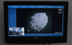 A television at NASA's Kennedy Space Center in Cape Canaveral, Florida, captures the final images from the Double Asteroid Redirection Test (DART) just before it smashes into the asteroid Dimorphos on September 26, 2022