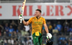 South Africa's David Miller celebrates scoring his century in Guwahati