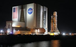 The Artemis-1 rocket is rolled out from the Vehicle Assembly Building en route to Launch Pad 39B at the Kennedy Space Center in Florida