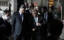 China's President Xi Jinping (L) and UN Secretary-General Antonio Guterres at the G20 leaders' summit in Indonesia