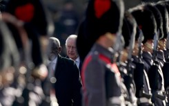 Ramaphosa and Charles inspect a Guard of Honour