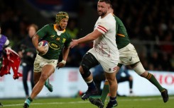 Try-scorer - South Africa wing Kurt-Lee Arendse (L) on the attack against England at Twickenham