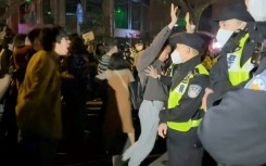 Angry crowds take to the streets in Shanghai as public opposition to China's zero-Covid policy grows