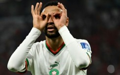 Youssef En-Nesyri celebrates scoring Morocco's second goal in the World Cup win against Canada that secured top spot in Group F