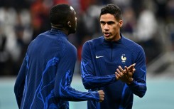 France defender Raphael Varane (right) sat out training two days before the World Cup final