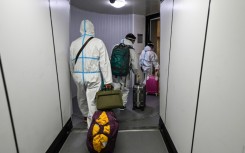 China will scrap quarantine on arrival in January