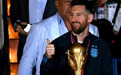 Lionel Messi (C) has been in Argentina since winning the World Cup