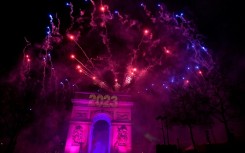 Fireworks explode over the Arc de Triomphe as France ushers in 2023