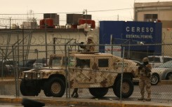 Members of the Mexican Army secure an area outside the Ciudad Juarez number 3 state prison on January 2, 2023