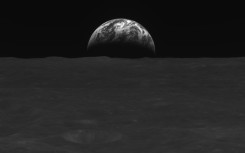 South Korea's first-ever lunar orbiter Danuri has sent black-and-white images of Earth and the lunar surface, including this photo taken on December 31, 2022