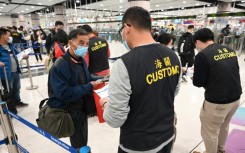 Up to 50,000 Hong Kong residents are now able to cross the border daily at three land checkpoints after registering online