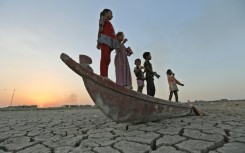 File: A dried-up river. AFP/Asaad Niazi