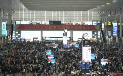 China: Passengers throng railway station as new year migration begins