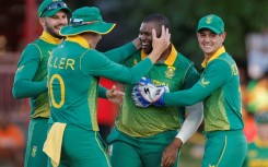 Man of the match: South Africa's Sisanda Magala is congratulated by teammates after the dismissal of England's Harry Brook 