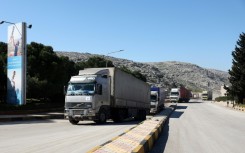 A United Nations aid convoy enters rebel-held northwestern Syria from Turkey through the Bab el-Hawa crossing