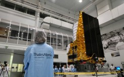 The spacecraft is unveiled to media in a clean room of the Thales Alenia Space company in the French city of Cannes