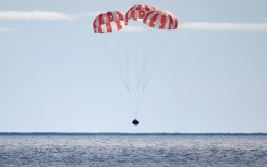 NASA's Orion space capsule splashes down in the Pacific after an uncrewed mission around the Moon