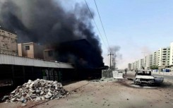 Sudanese civlians desperate to escape the fighting in the capital Khartoum prepare to board a bus out