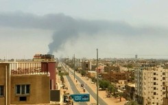 Smoke billows in Khartoum during heavy battles despite latest truce