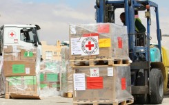 Boxes of humanitarian aid in Amman, Jordan are readied for a flight to Port Sudan