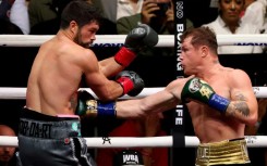 Mexican boxer Saul "Canelo" Alvarez battered John Ryder to retain the undisputed super middleweight world title